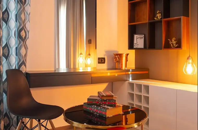 Desk unit with mirror, pendant lamps and copper ice bucket